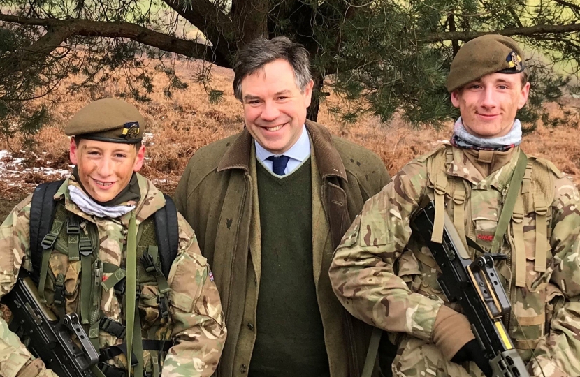 Jeremy Quin with members of the Horsham Army Cadet Force at Crowborough Camp.