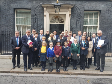 Jeremy Quin with local school children and fellow West Sussex MP's